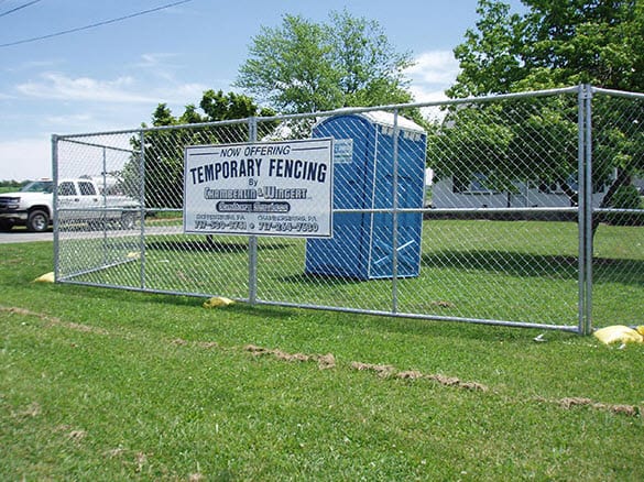 temporary fencing around a porta potty