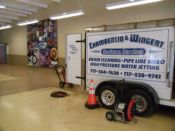 sewer drain line cleaning trailer indoors