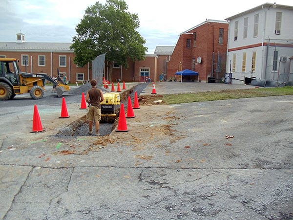 prepping a site for a sewer drain line cleaning
