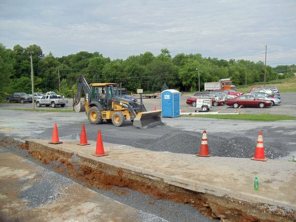 prepping a site for a sewer drain line cleaning