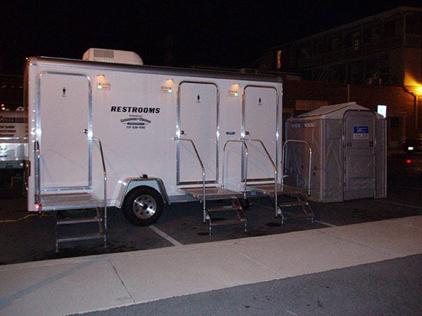 3 stall portable restroom at night