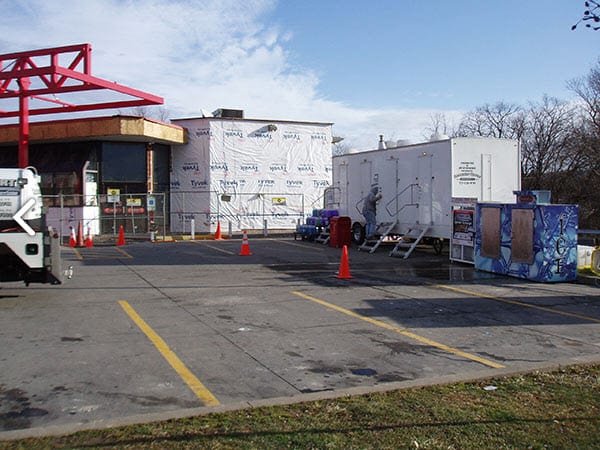 portable restroom trailer at a renovation site