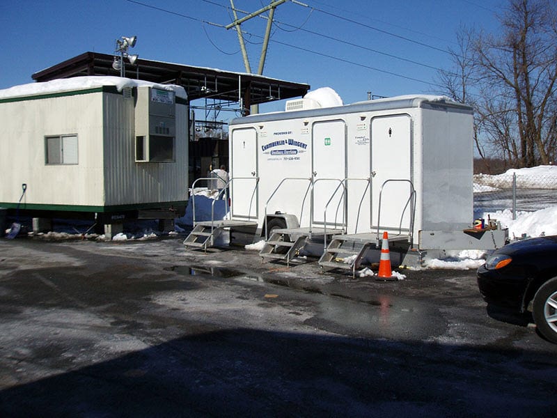 restroom trailer at a snowy work area